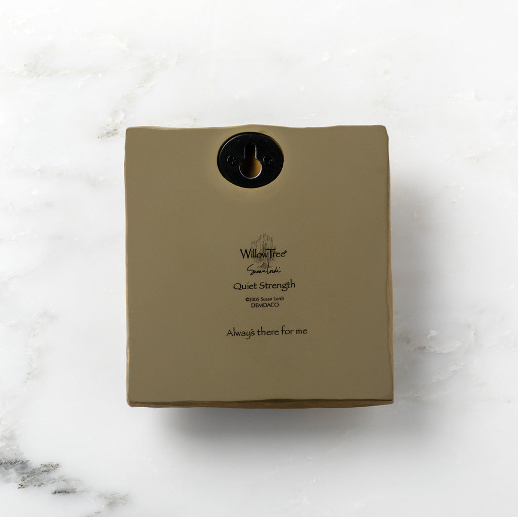 Back of olive-colored plaque reading "Quiet Strength" with Willow Tree logo