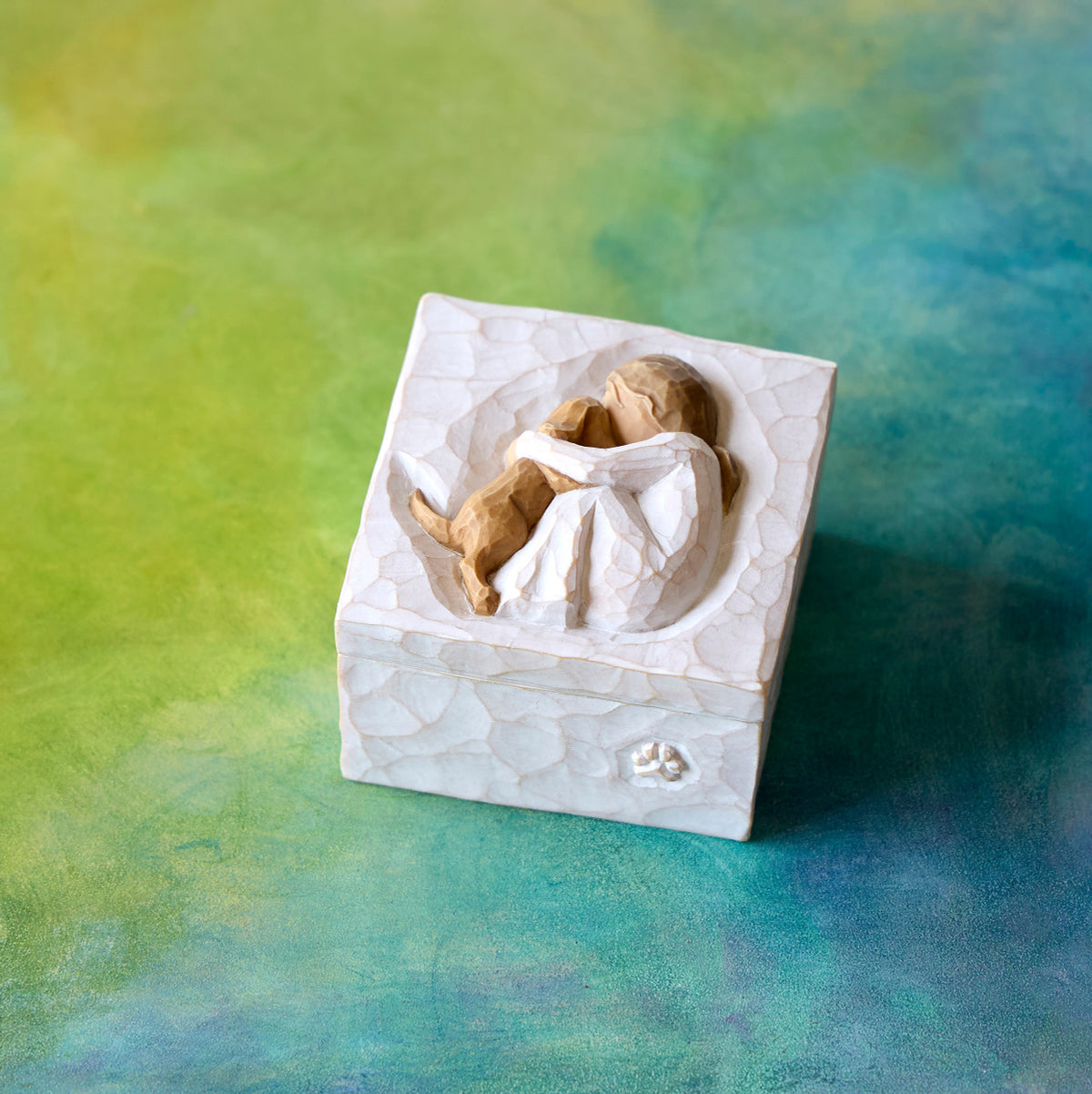 Willow Tree Friendship True Box, 3”sq x 2”h hand-painted resin box with removable lid. Lid has bas-relief carving of seated figure in cream dress, playing with yellow dog