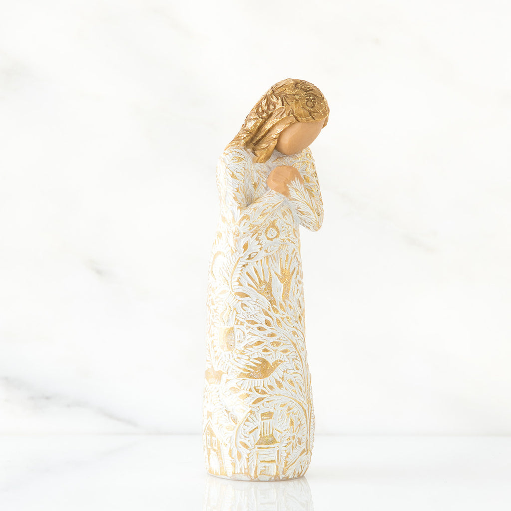Gold hair girl figurine in white/gold dress - close view - all white background
